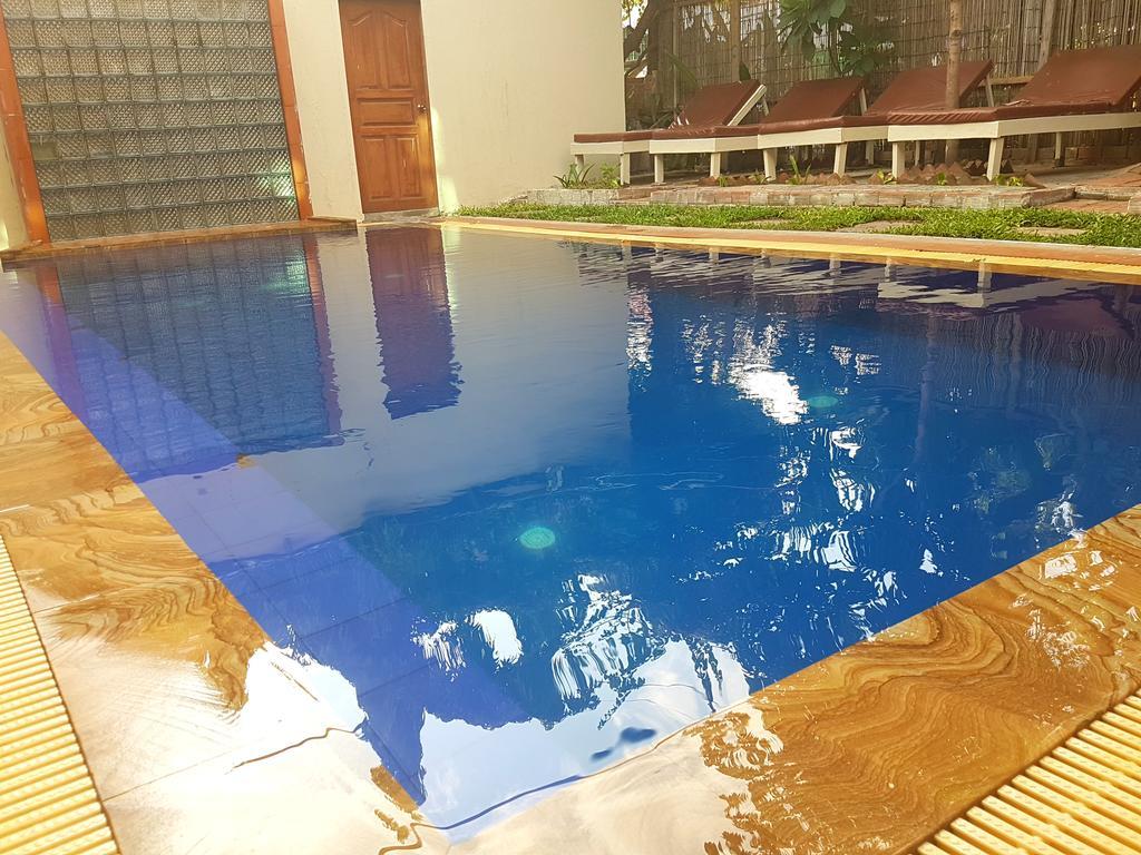Angkor Reas Guesthouse Siem Reap Extérieur photo